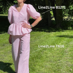 B1271 Peplum bluse med pufærmer og elastik